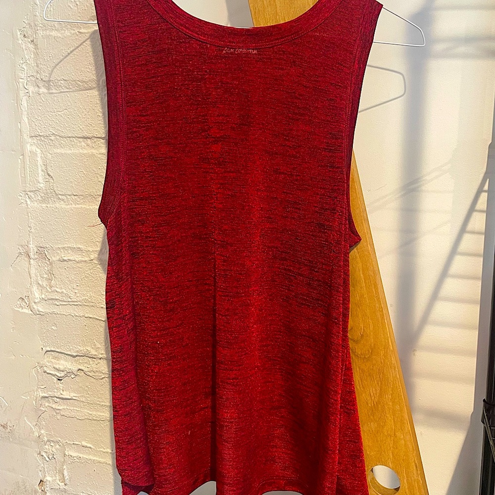 Gently used Sam Edelman shirt with high cut back. Great condition, fun color!